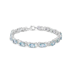 .925 Sterling Silver 16.0 Cttw Oval Blue Topaz and Diamond Accent Tennis X Link Bracelet