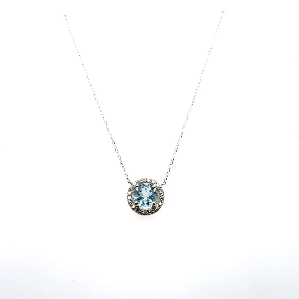 Blue Topaz With Diamond Halo Set in 14k White Gold at Regard Jewelry in Austin, Texas