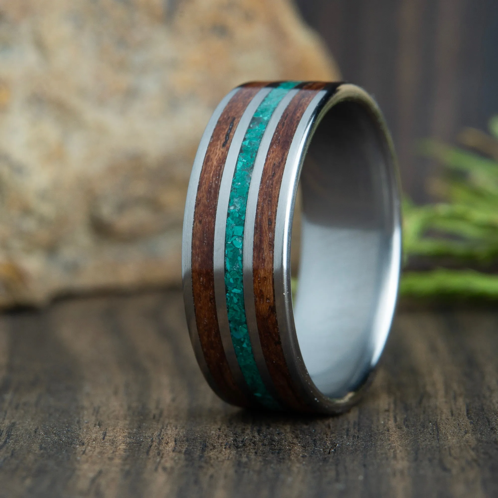 Bubinga and malachite wood wedding band with polished titanium