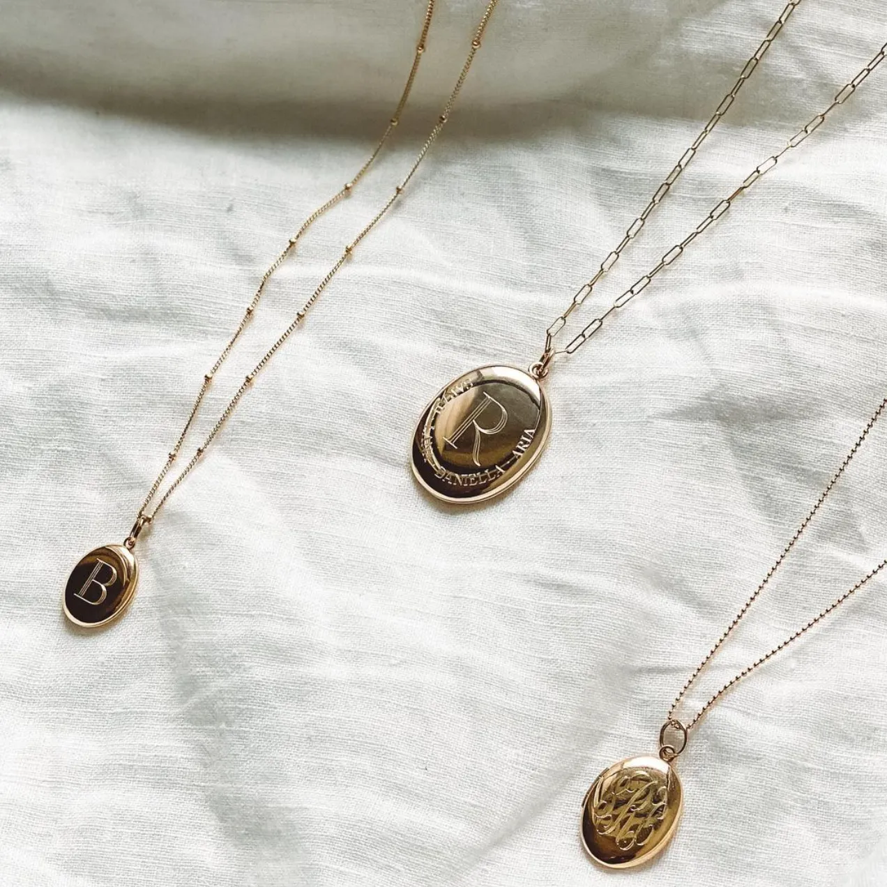 CHARLI LARGE OVAL ENGRAVED LOCKET