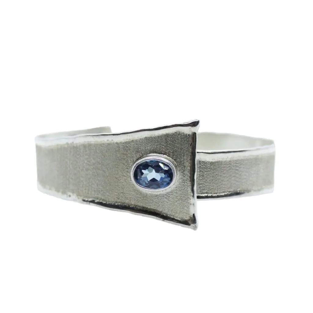 DESIGNER SILVER BRACELET WITH BLUE TOPAZ GEMSTONE AT REGARD JEWELRY IN AUSTIN, TEXAS