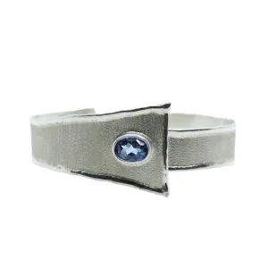 DESIGNER SILVER BRACELET WITH BLUE TOPAZ GEMSTONE AT REGARD JEWELRY IN AUSTIN, TEXAS