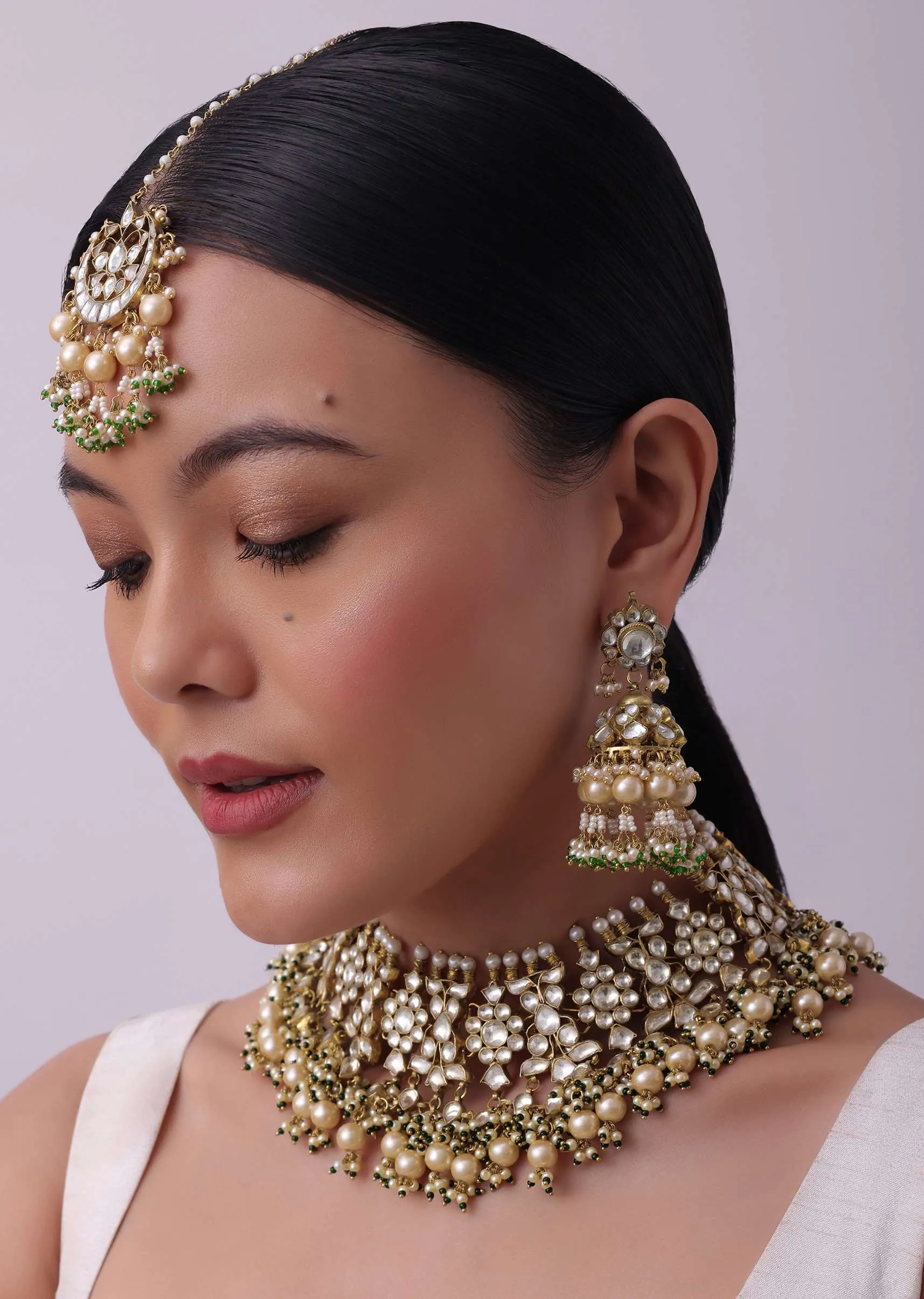 Gold Finish Heavy Bridal Choker And Maang Tikka Set