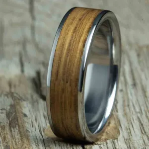 Ring with whiskey barrel wood and titanium